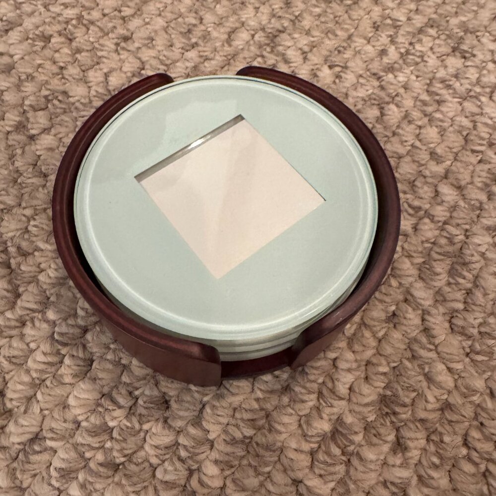 Set of 4 beautiful and contemporary frosted glass coasters with mahogany holder